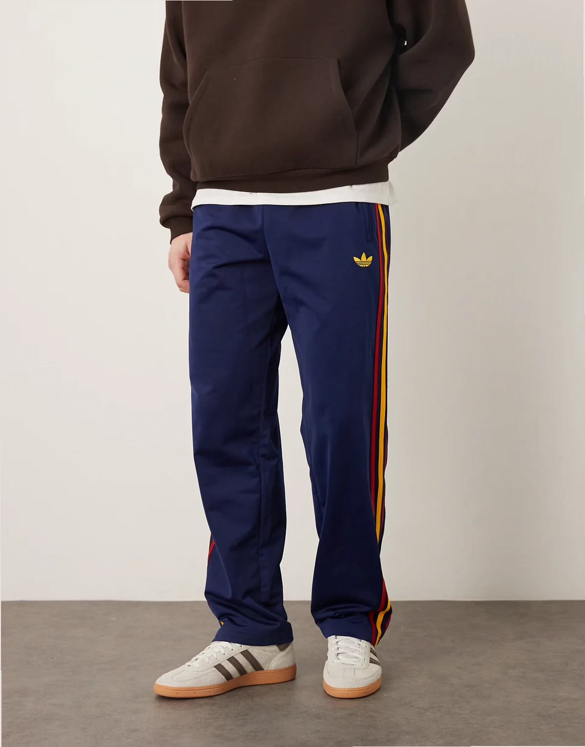 firebird track pants in navy and yellow