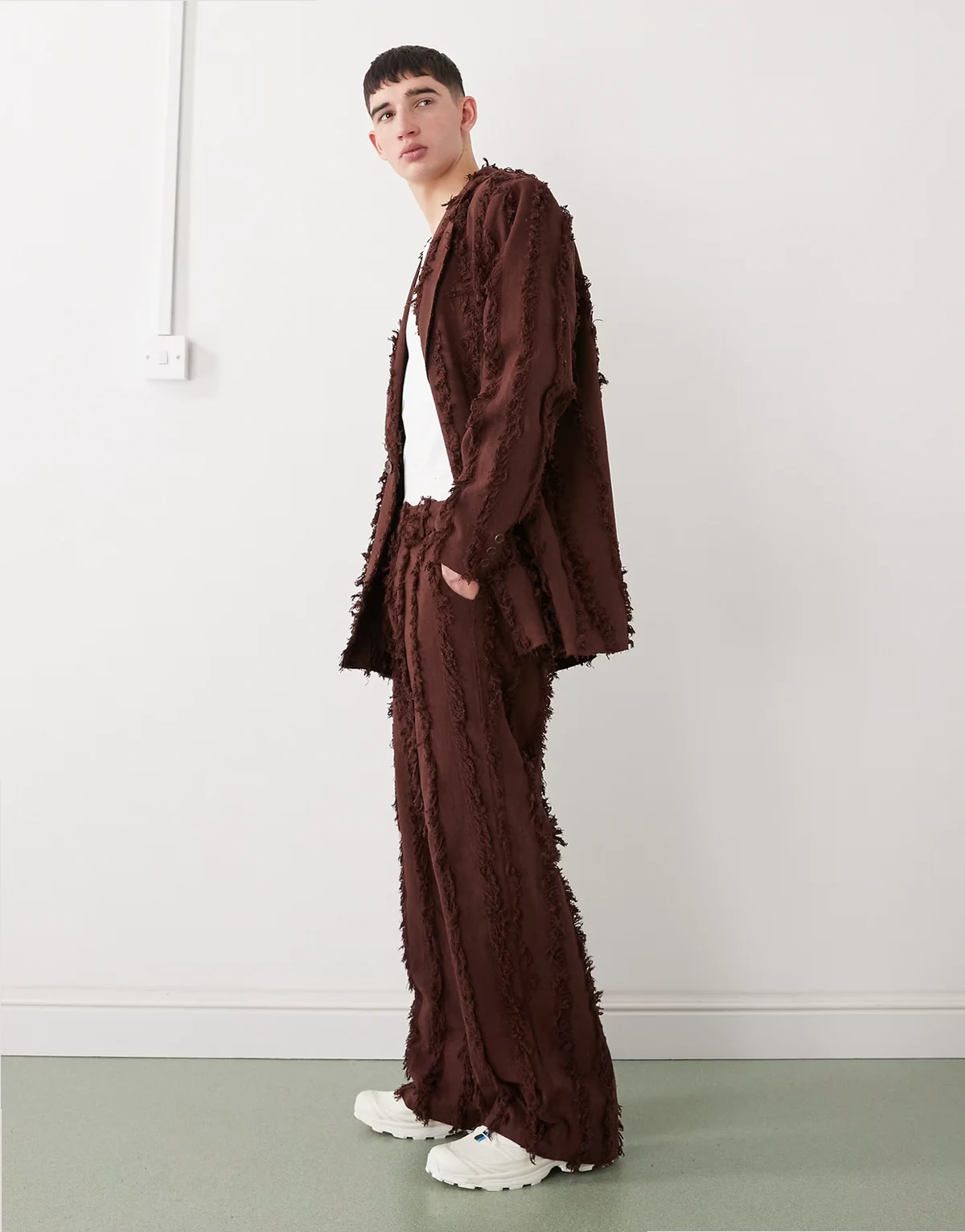 tailored pants in brown with fraying