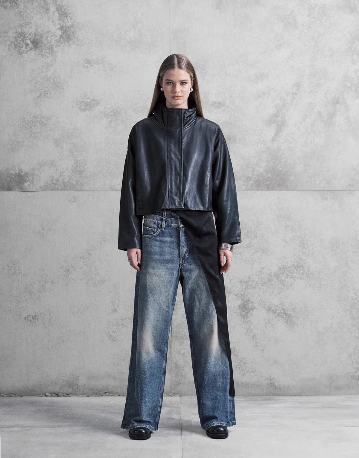 Unisex loose fit wide leg baggy jeans with double waistband detailing in faded blue wash