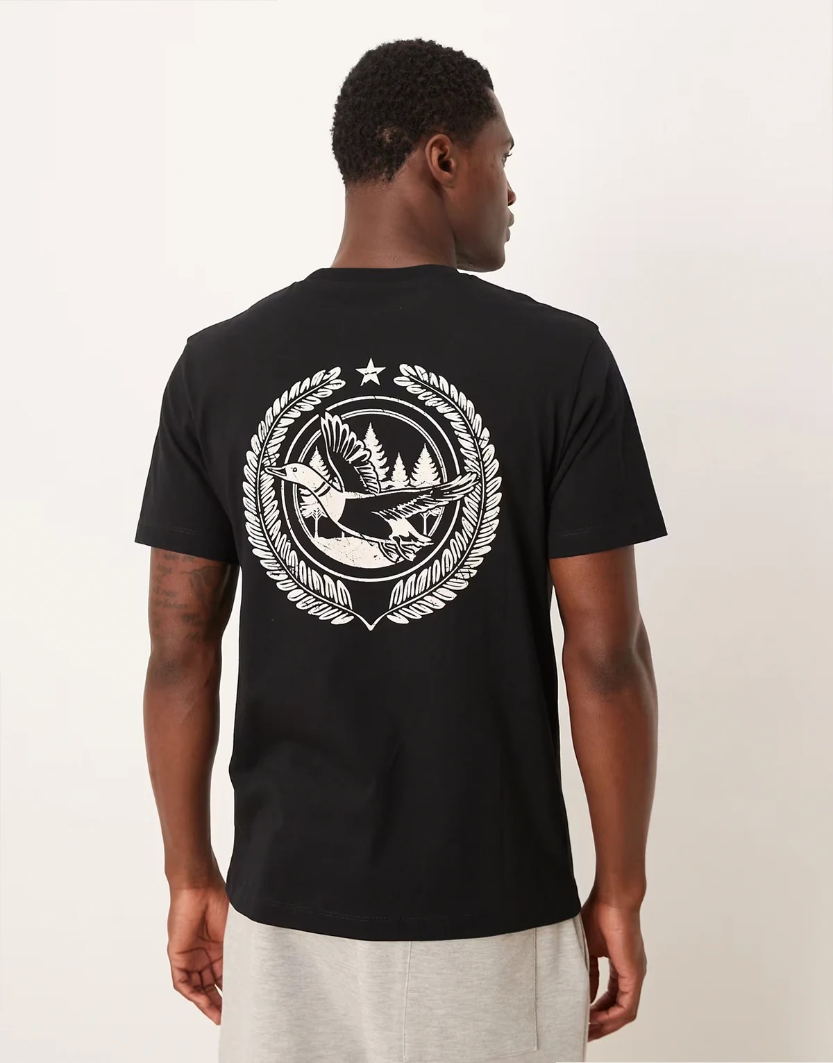 – T-Shirt in Schwarz mit Enten-Print