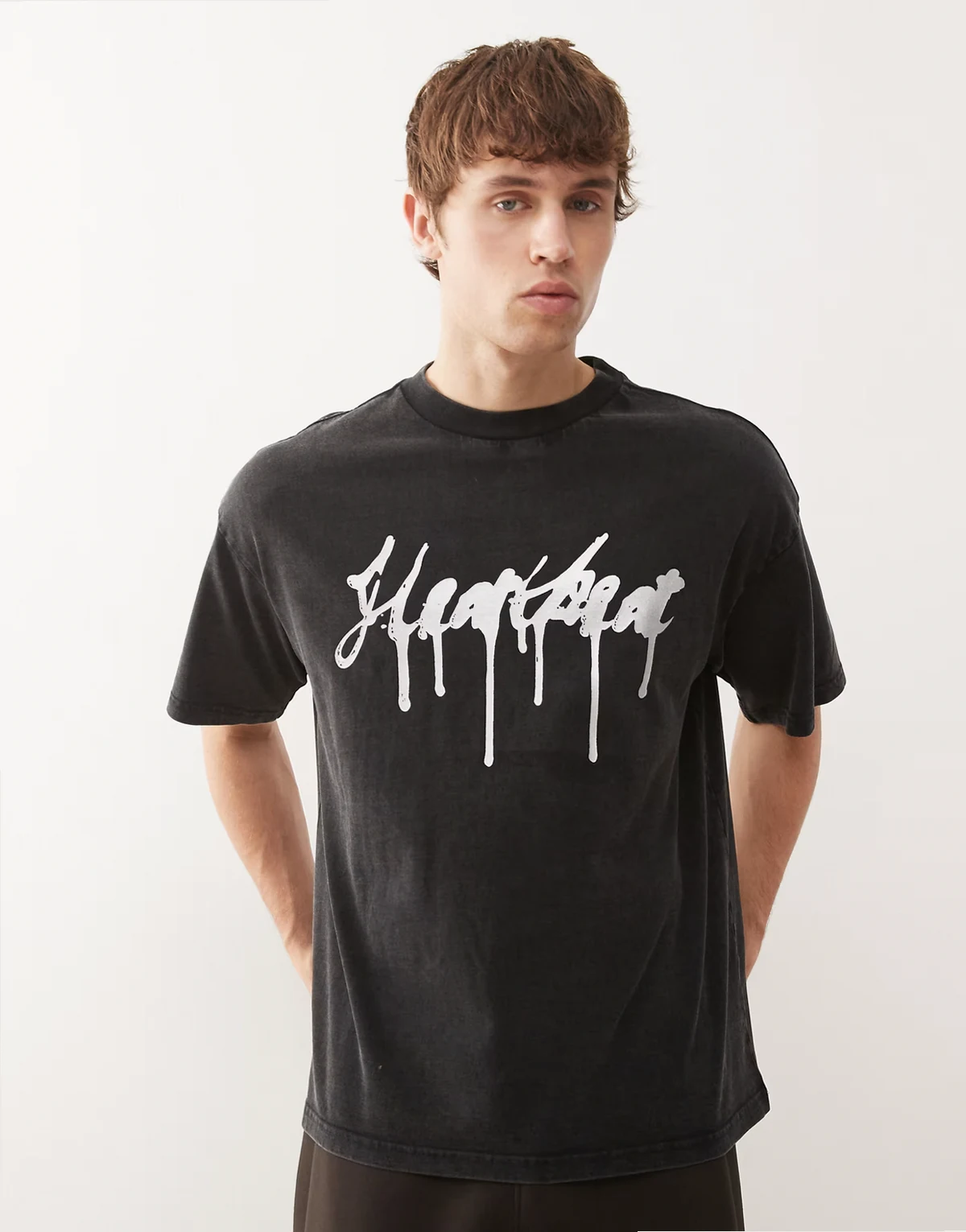 boxy fit T-shirt in black with heartbeat graphic