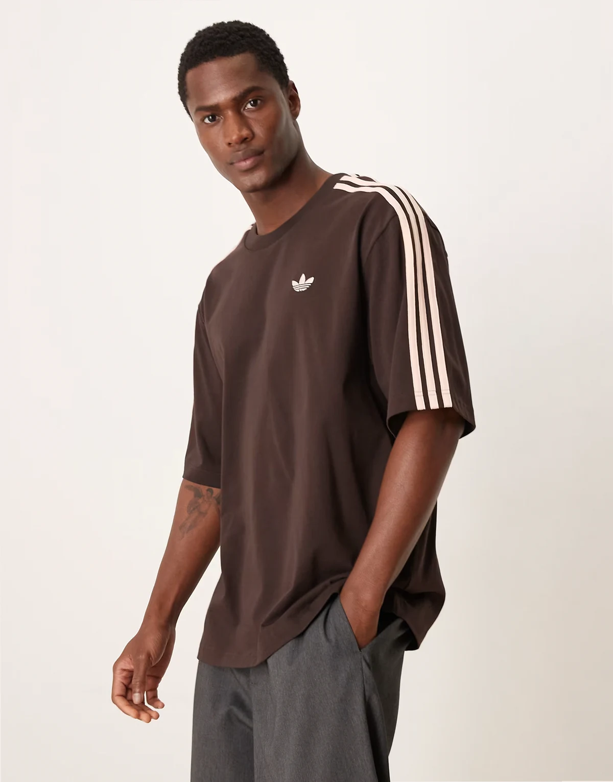three stripe track top in brown