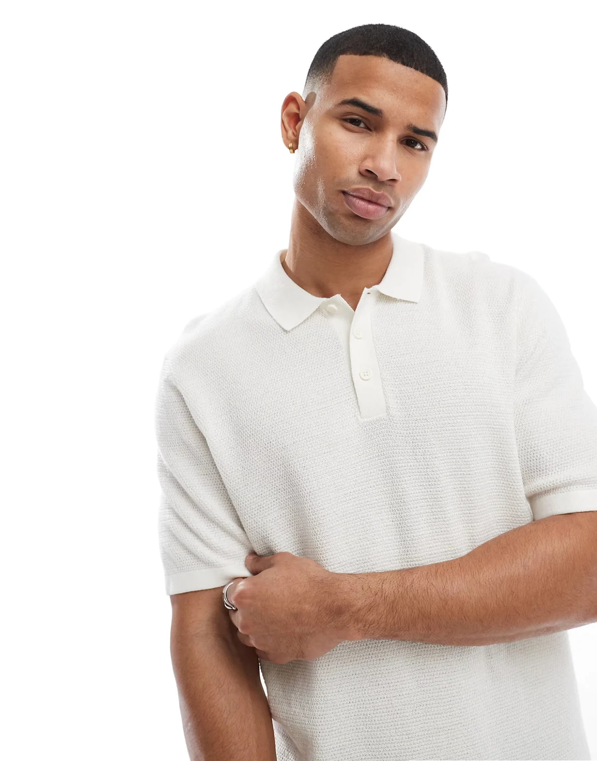 textured knit polo in cream