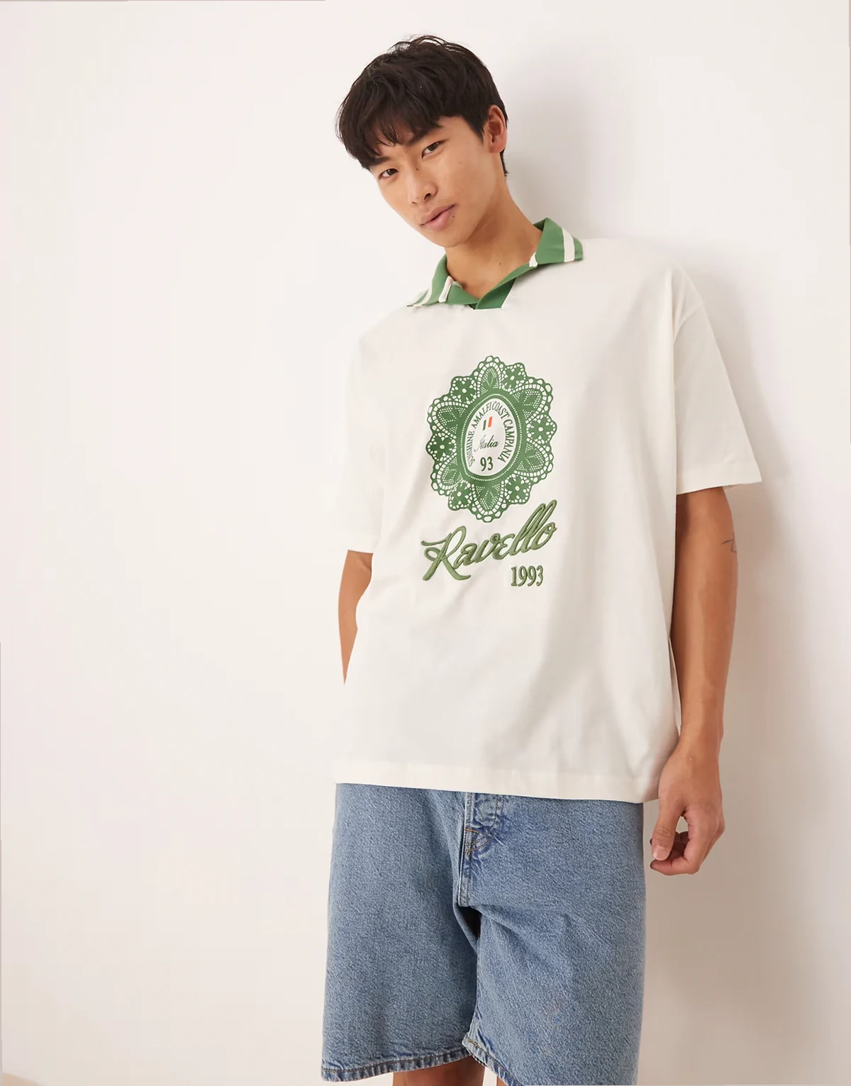 oversized polo shirt with city print in off-white