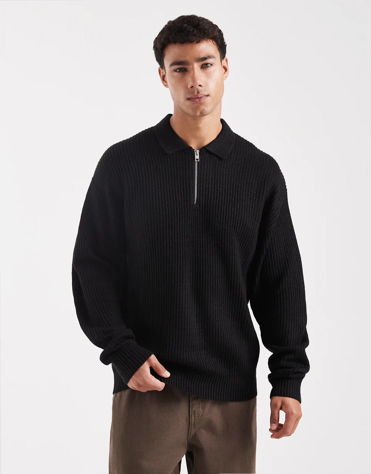 oversize knit polo in black