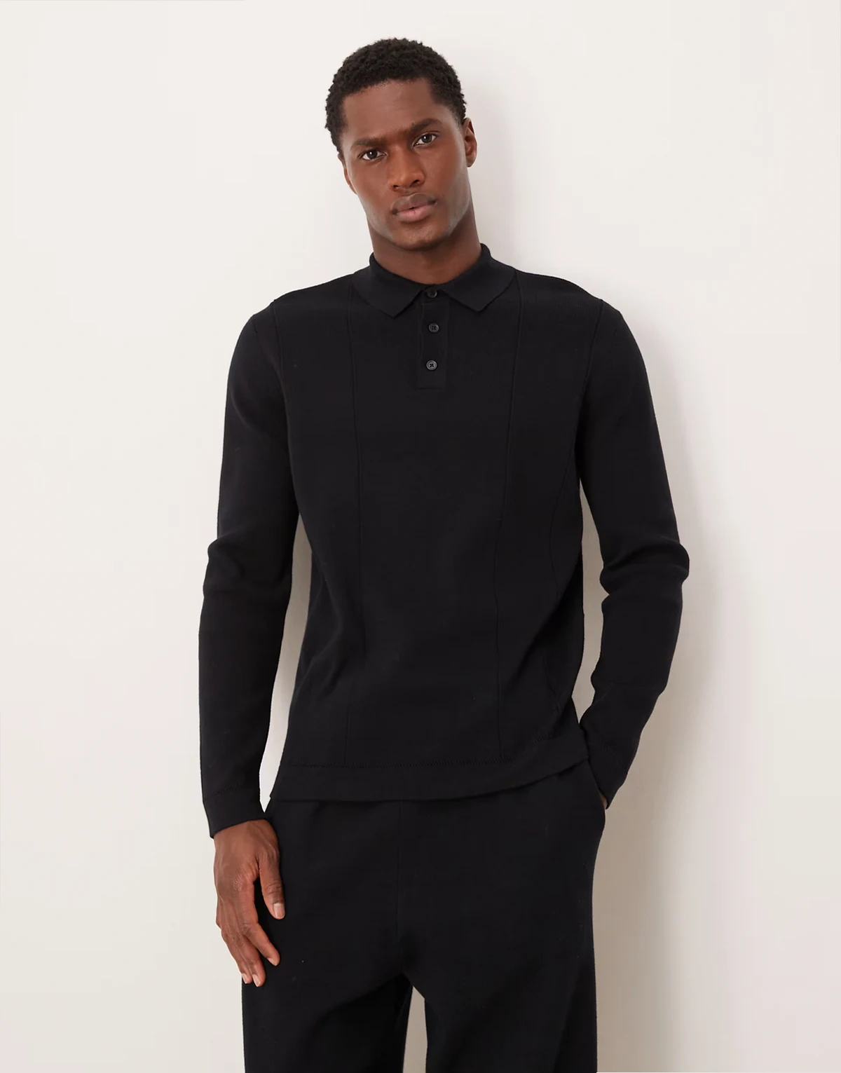 relaxed compact knit polo in black