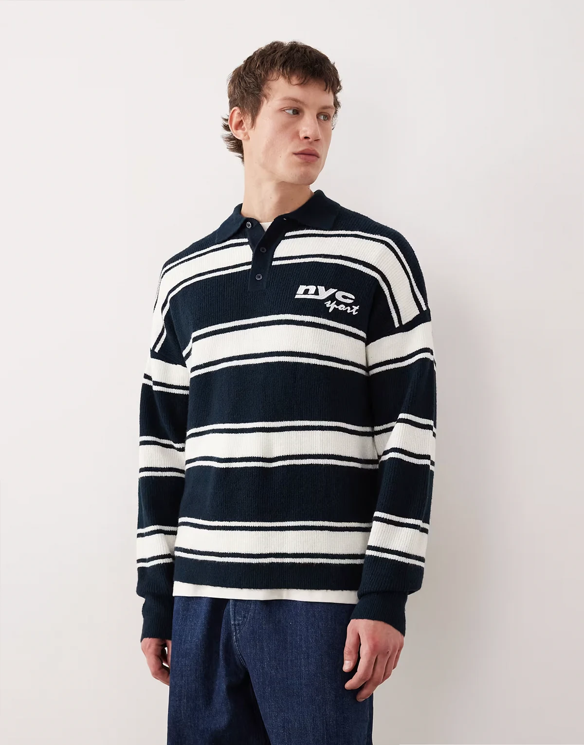 relaxed knit long sleeve polo with chest embroidery in navy and ecru stripe