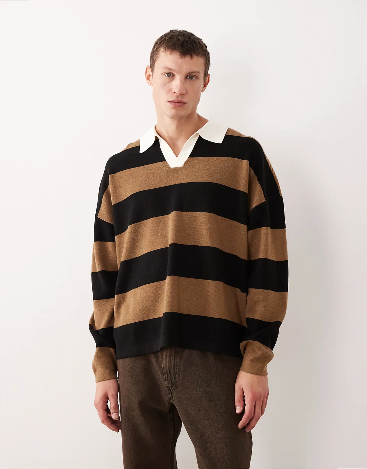 relaxed knit polo in black and brown stripe