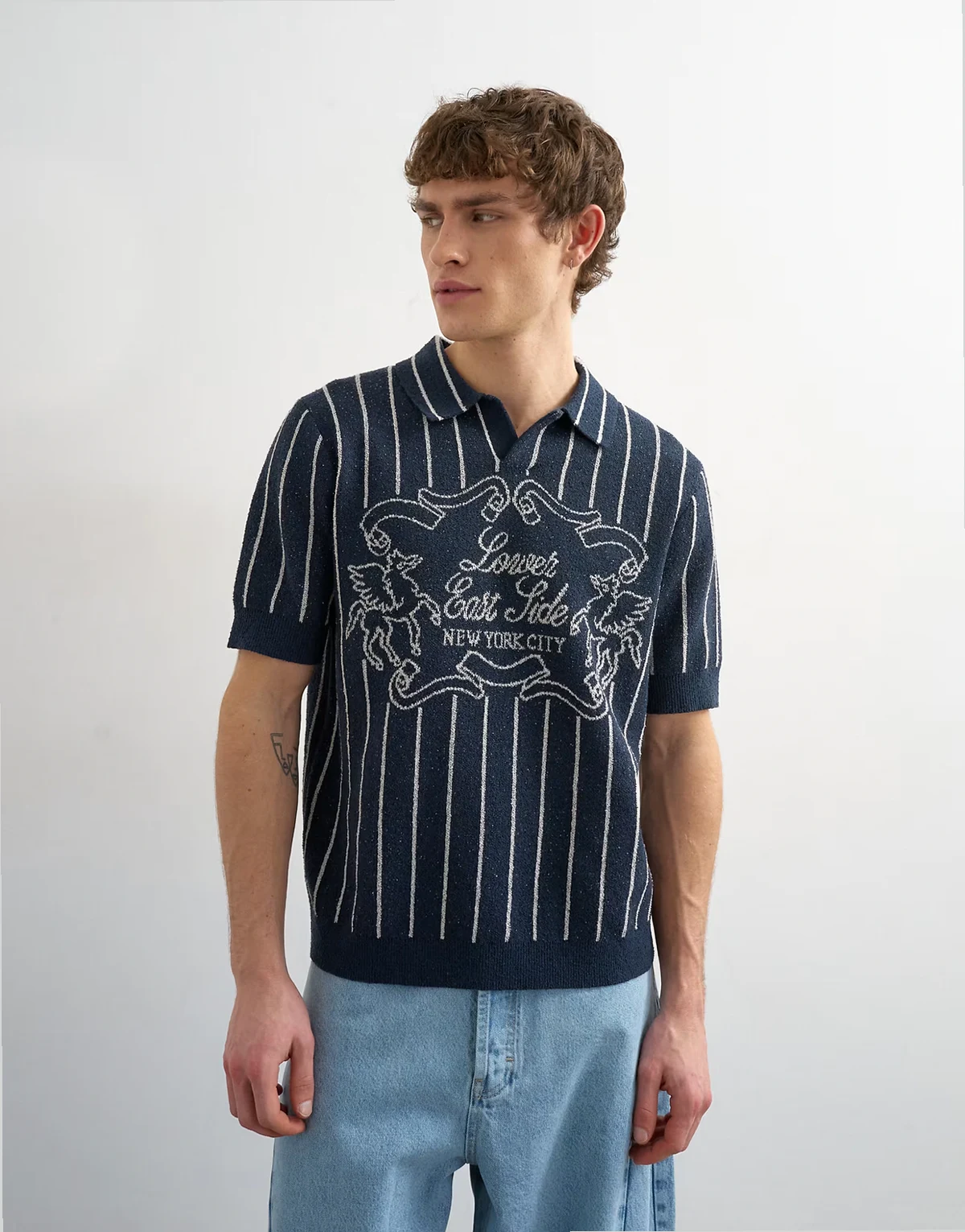 relaxed fit knit striped polo with east side jacquard in navy