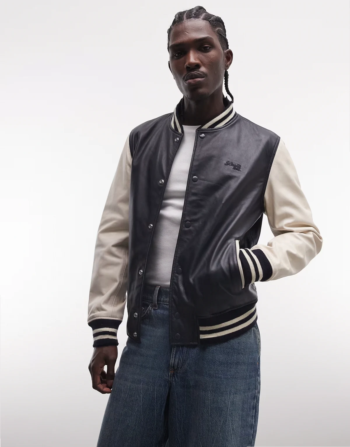 leather varsity jacket in navy and off white