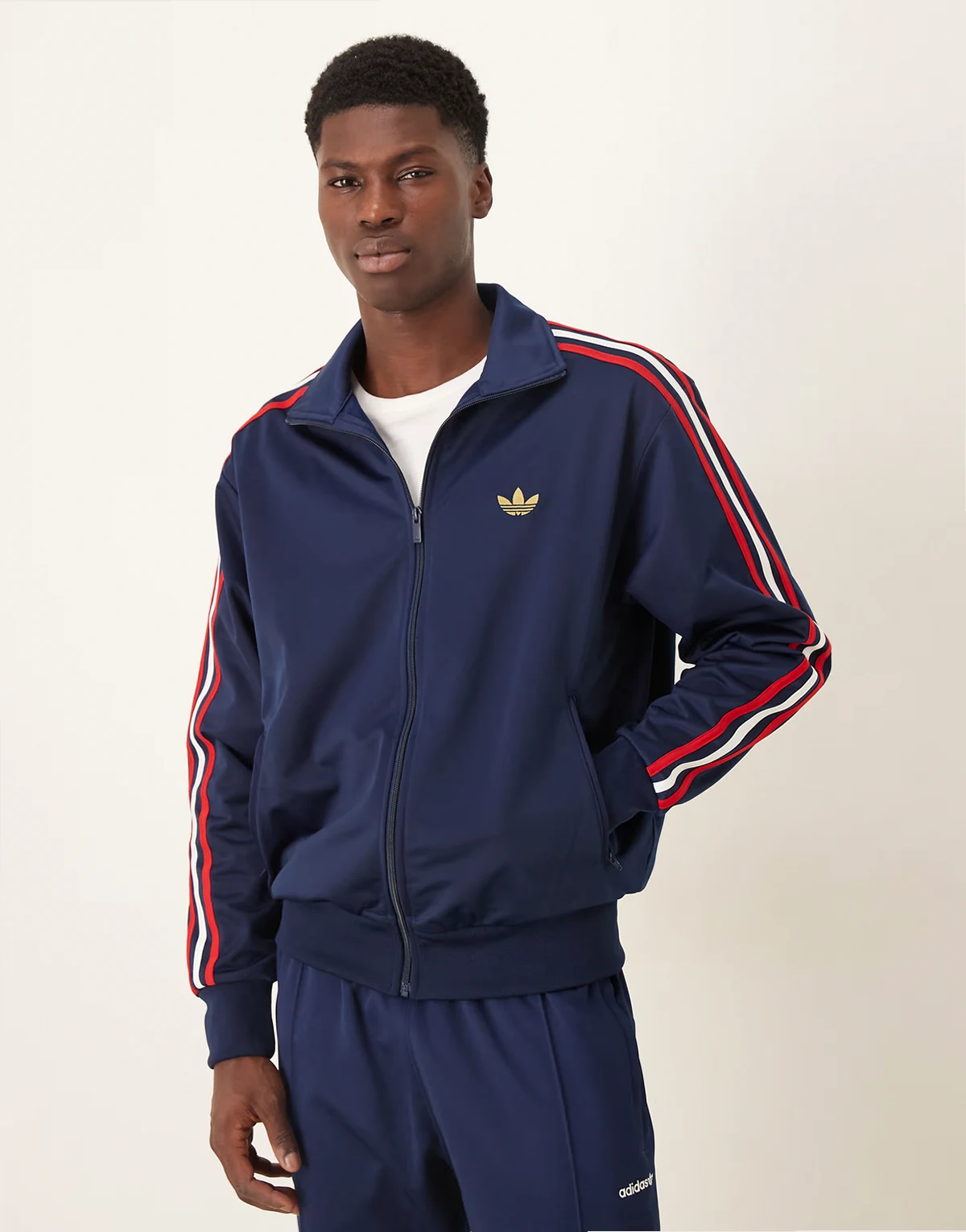 adidas Firebird track top in navy