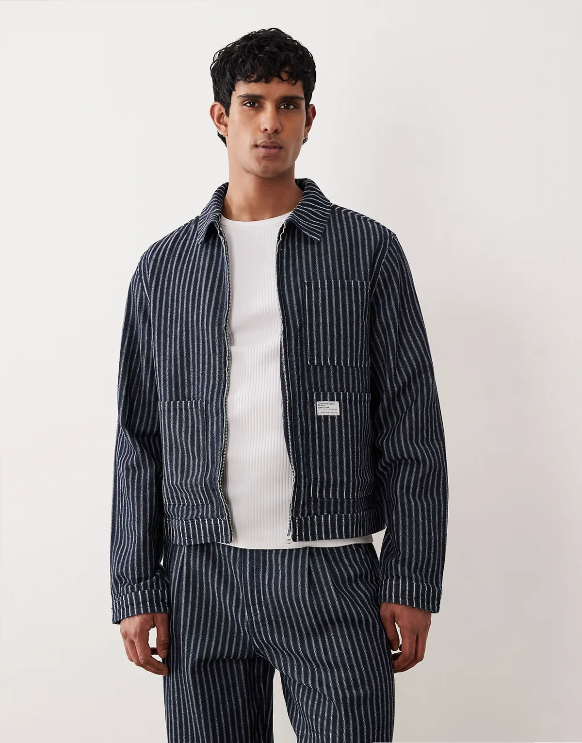 denim workwear jacket in dark wash blue with patch and pinstripe - part of a set
