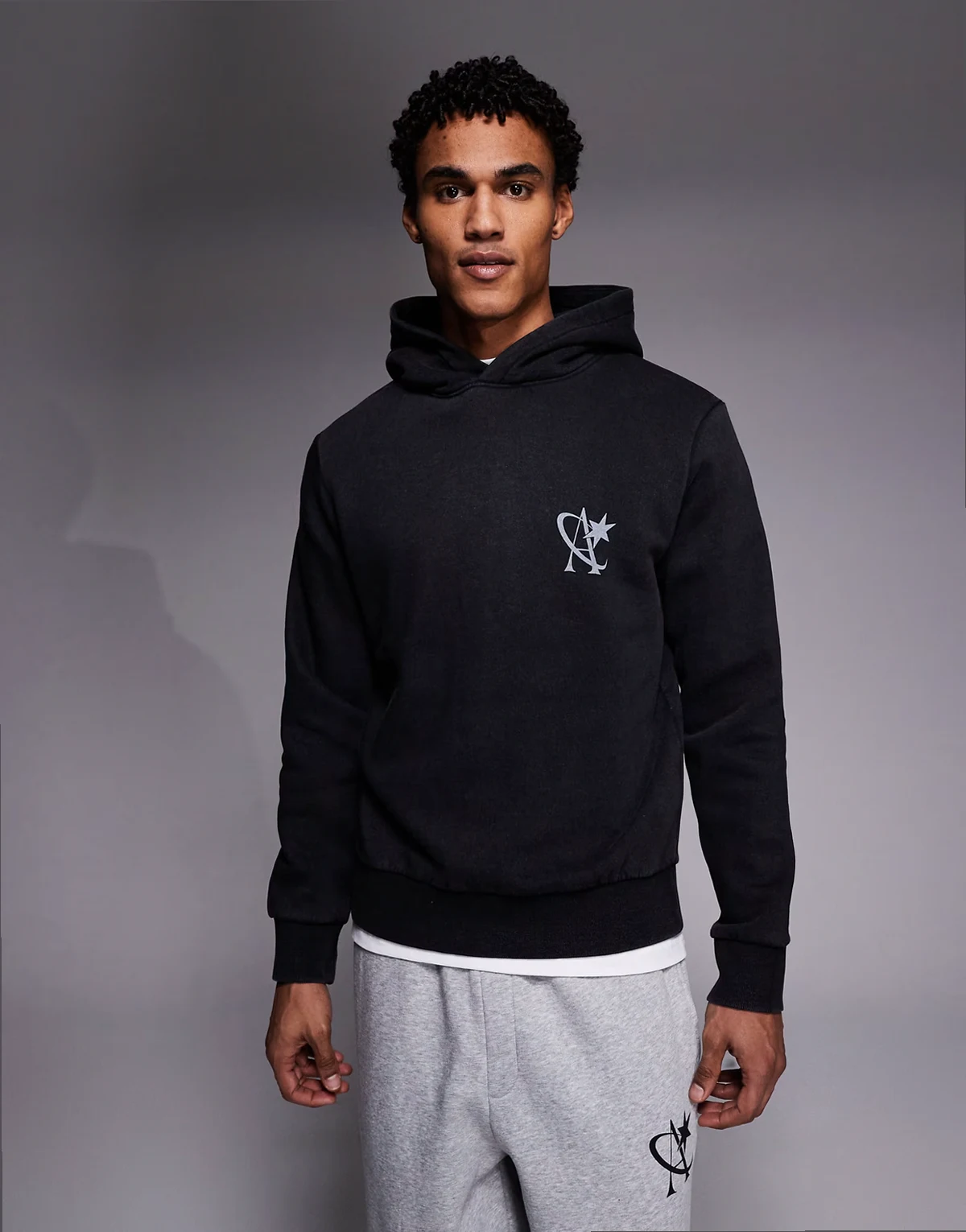 oversized hoodie with star logo in washed black