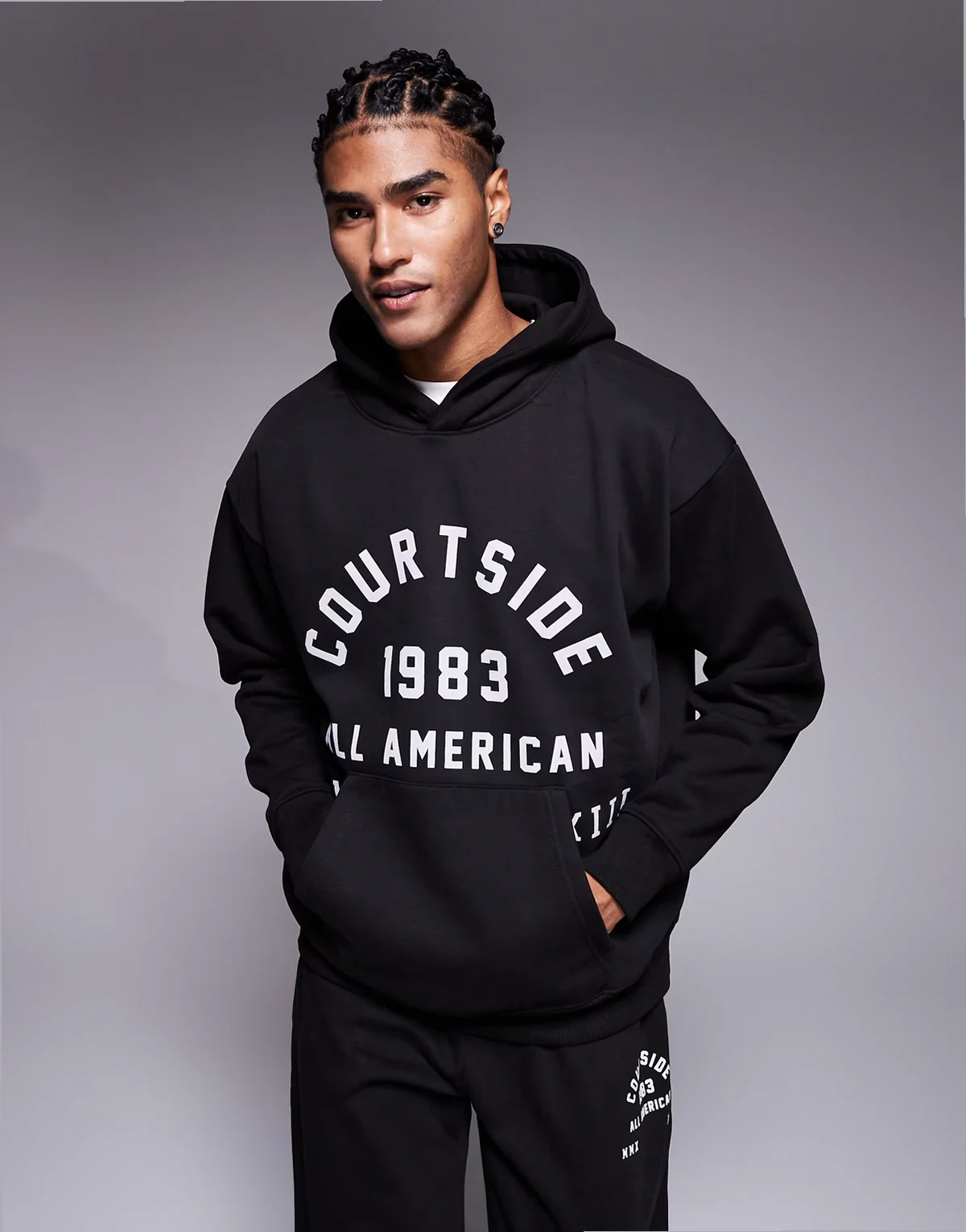 oversized pullover hoodie in black with collegiate print - part of a set