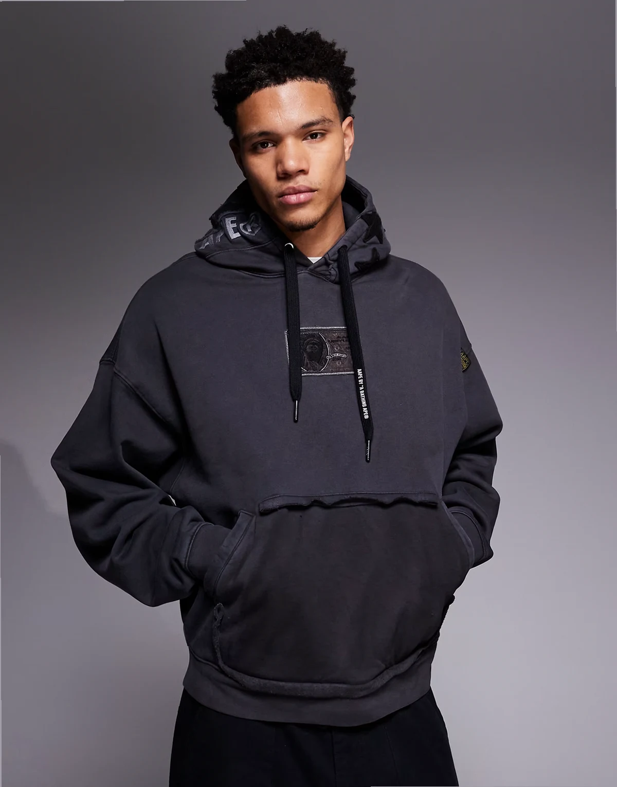 AAPE by A BATHING APE – Oversize-Kapuzenpullover aus stückgefärbtem Material in Schwarz