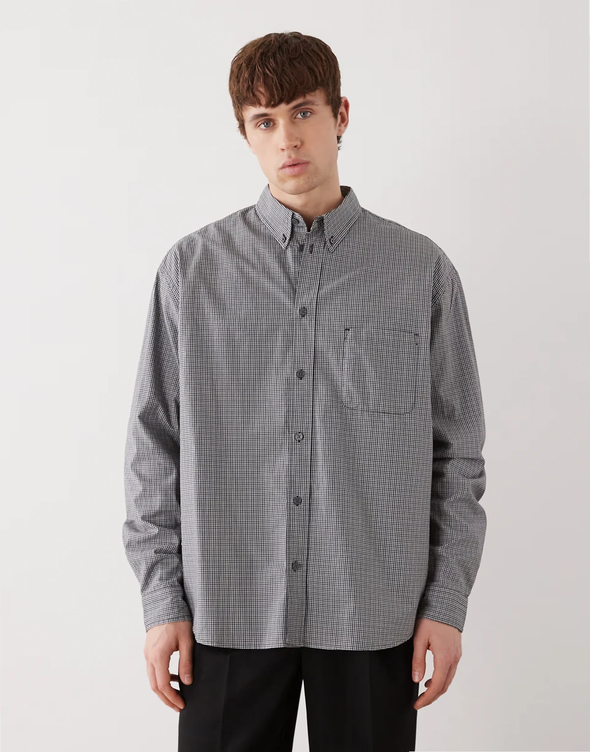 loose fit long sleeve shirt in black and beige plaid