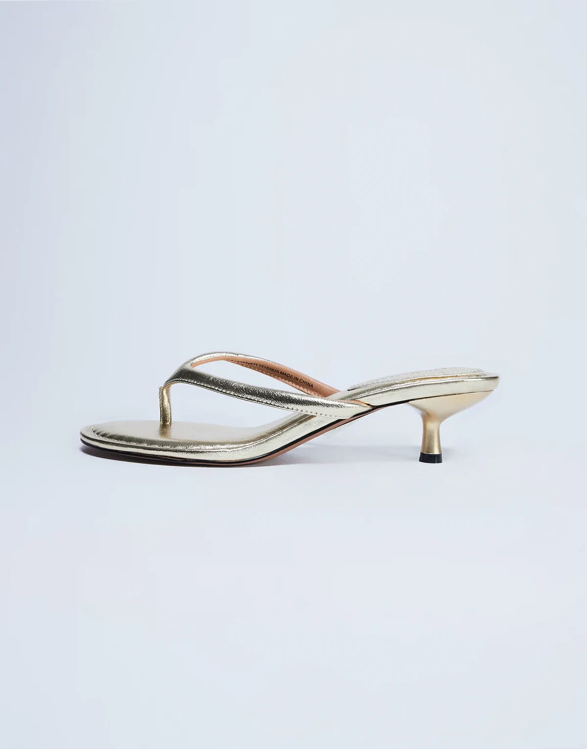 Axel toe thong mid heel sandals in gold