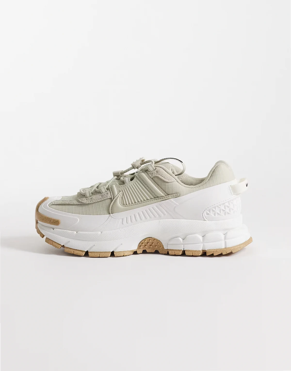 Zoom Vomero Roam sneakers in sage green and white