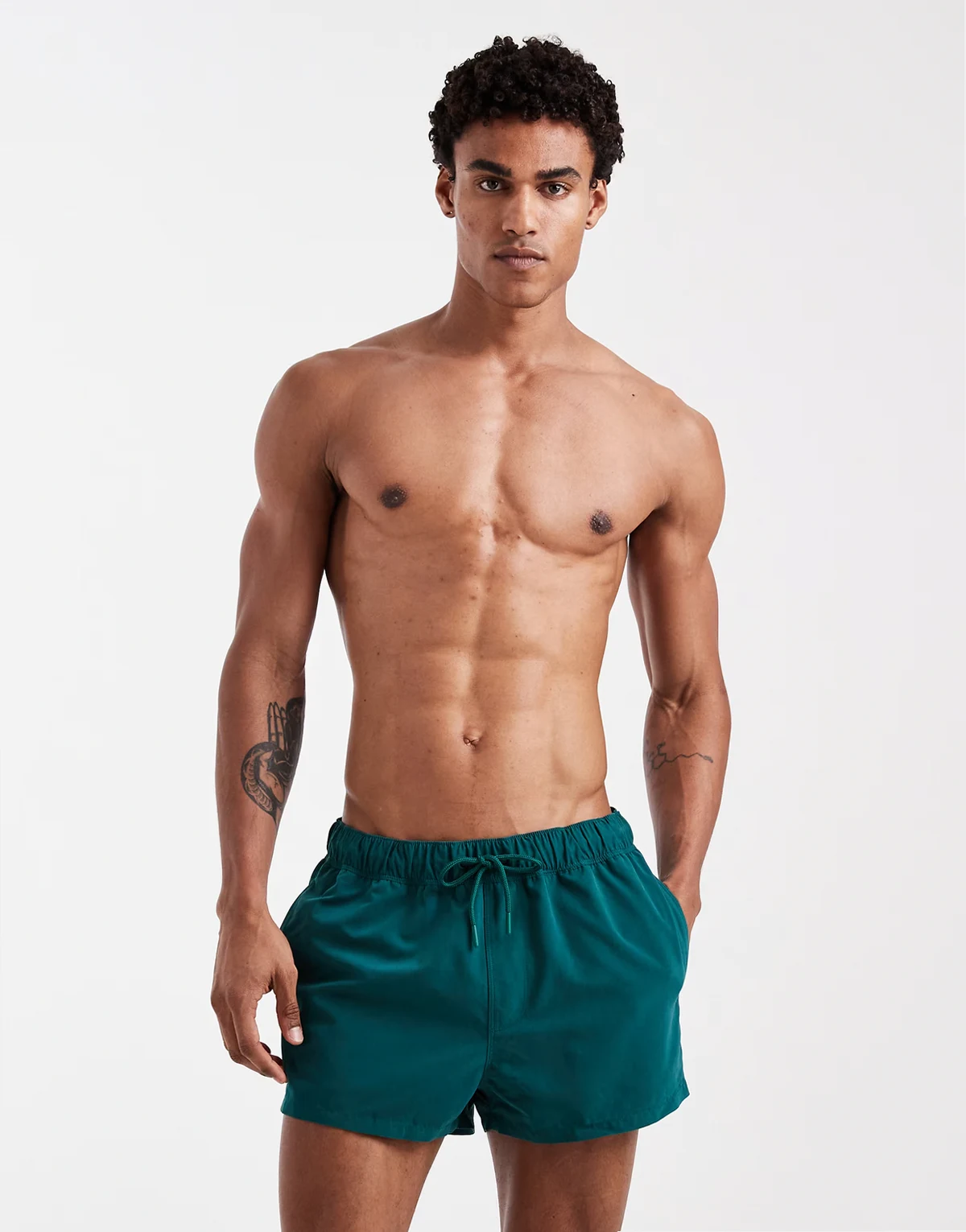 swim shorts in super short length in dark green