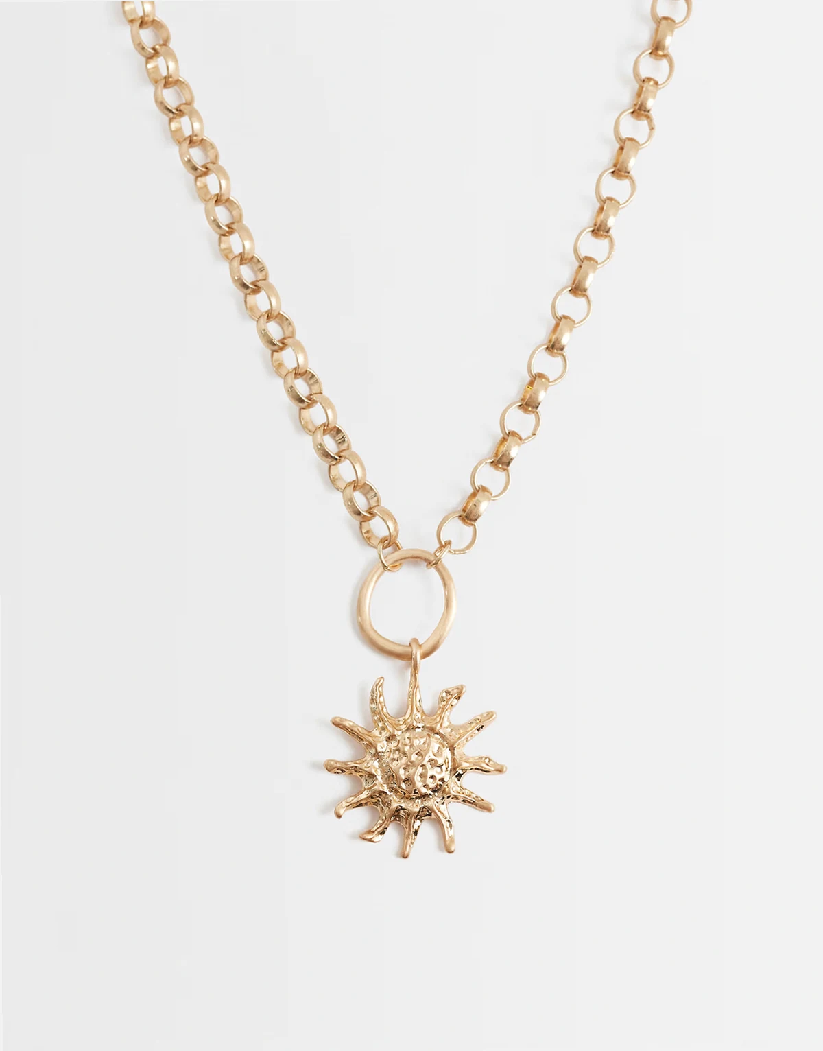 necklace with chunky chain and sun charm pendant in brushed gold tone