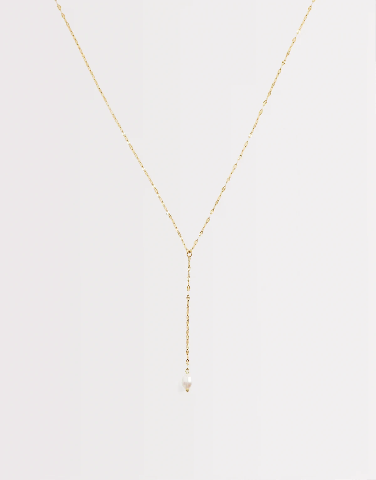 lariat necklace with pearl pendant in 18kt gold plated stainless steel