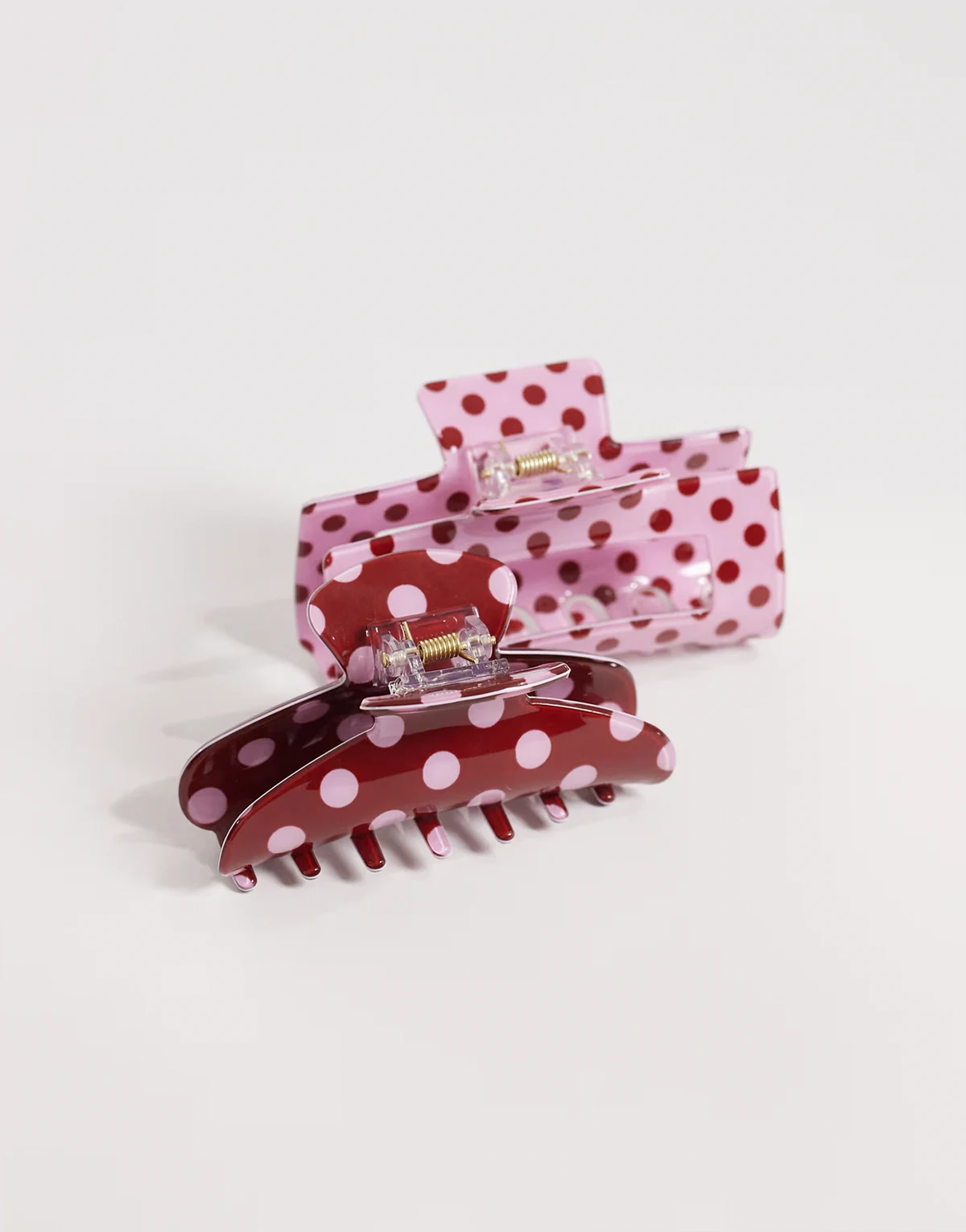pack of 2 polka dot hair claw clips in burgundy and pink