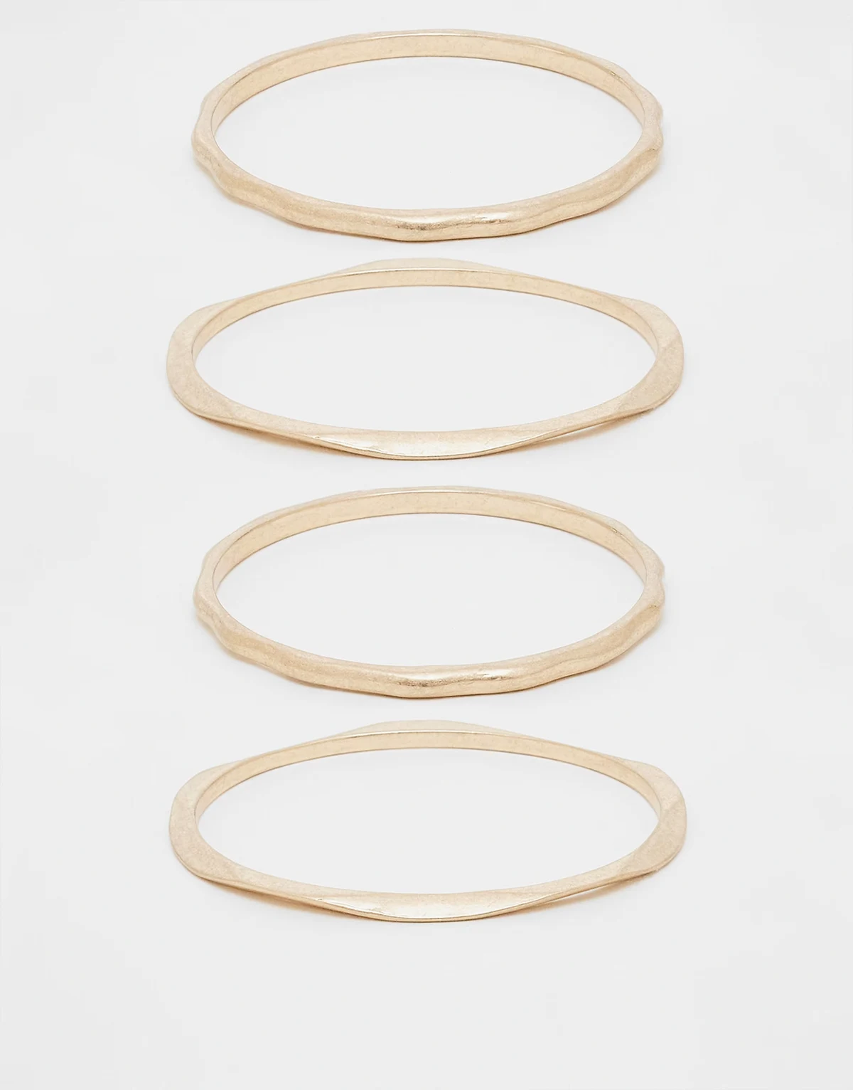 pack of 4 bangles with molten design in brushed gold tone