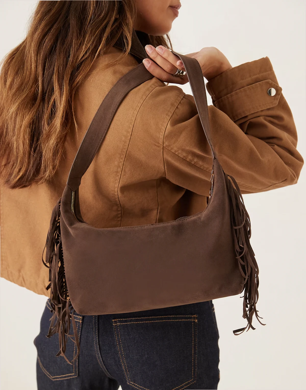faux suede shoulder bag with fringe in brown
