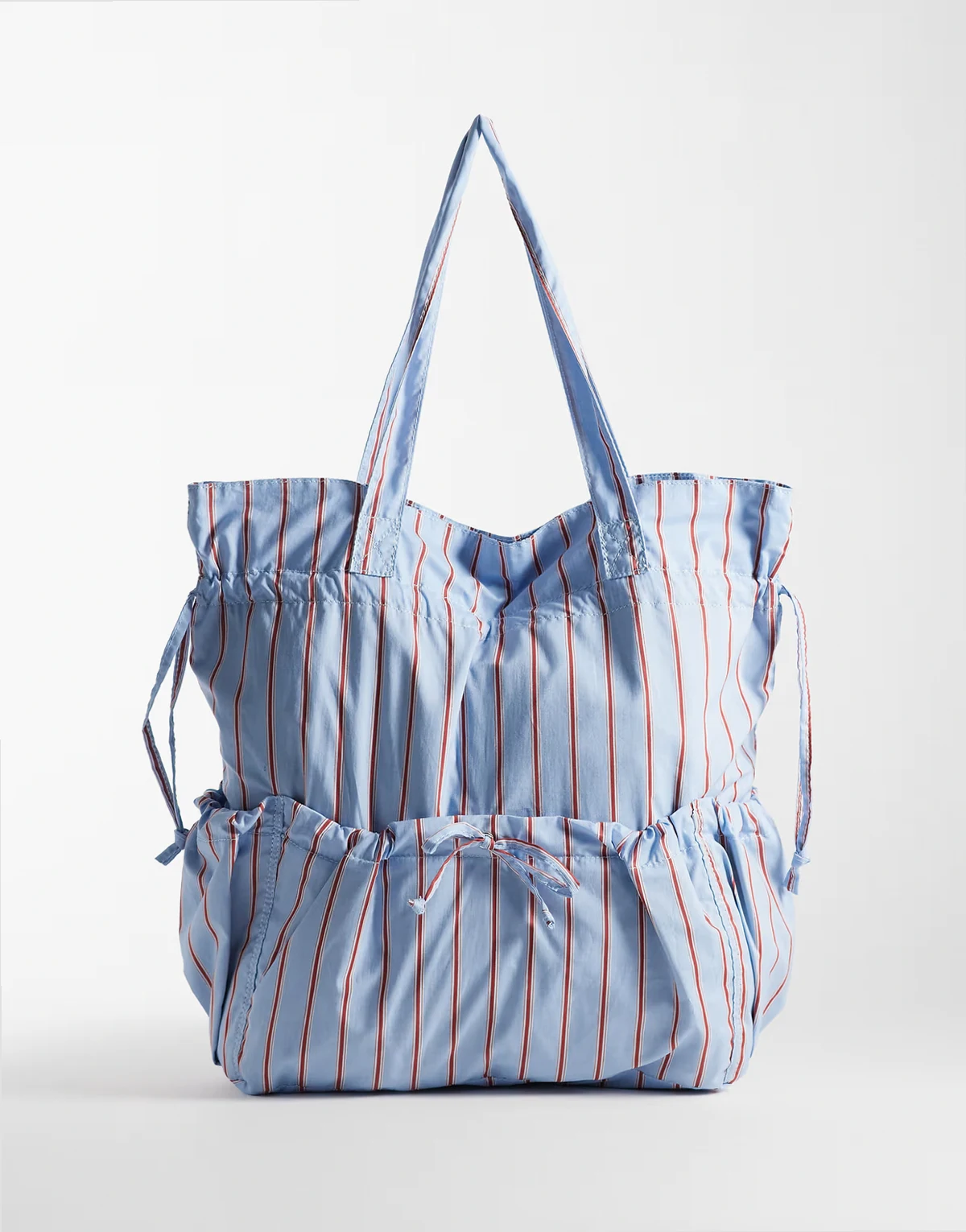 ruched pocket tote bag in blue and red stripe
