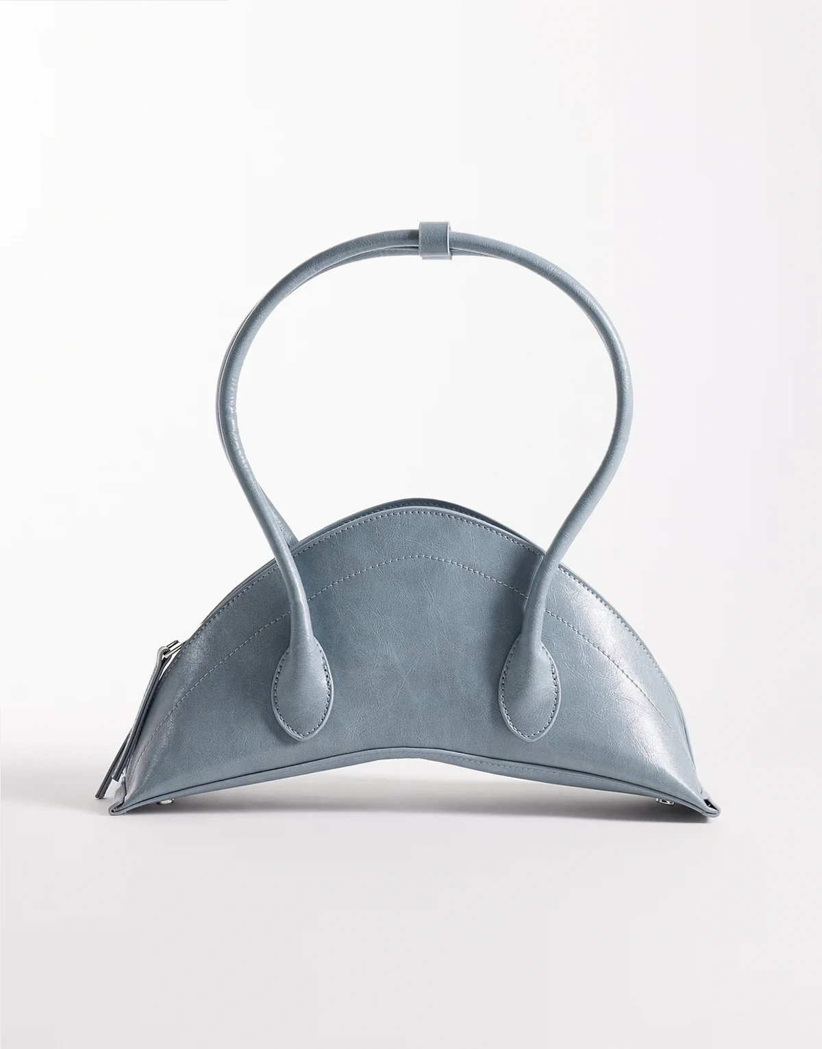 structured croissant clutch purse in dusty blue