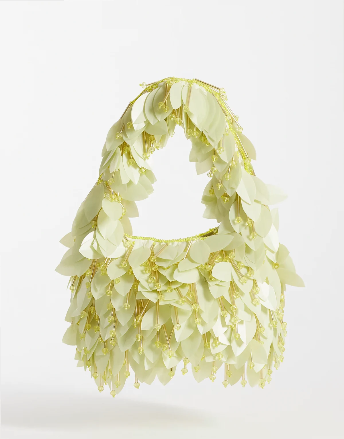 leaf embellished clutch purse in yellow