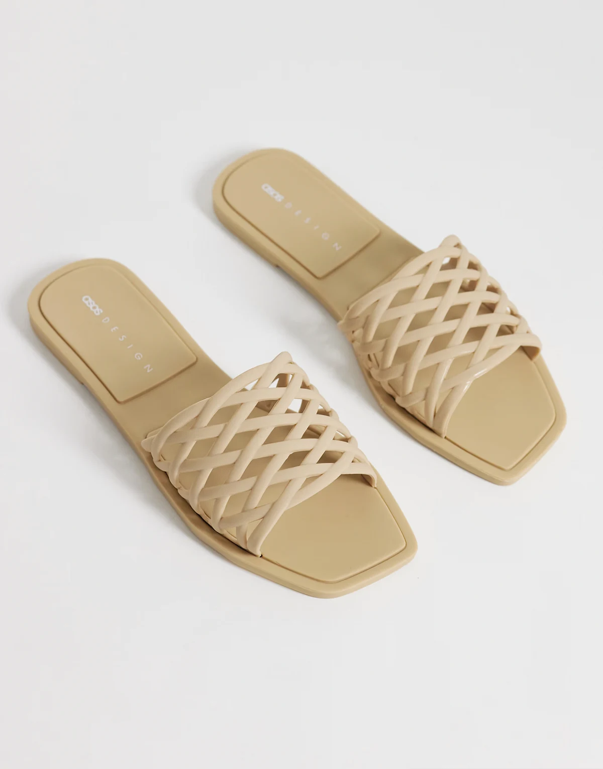 – Faris – Flache Jelly-Mules mit Web-Design in Taupe