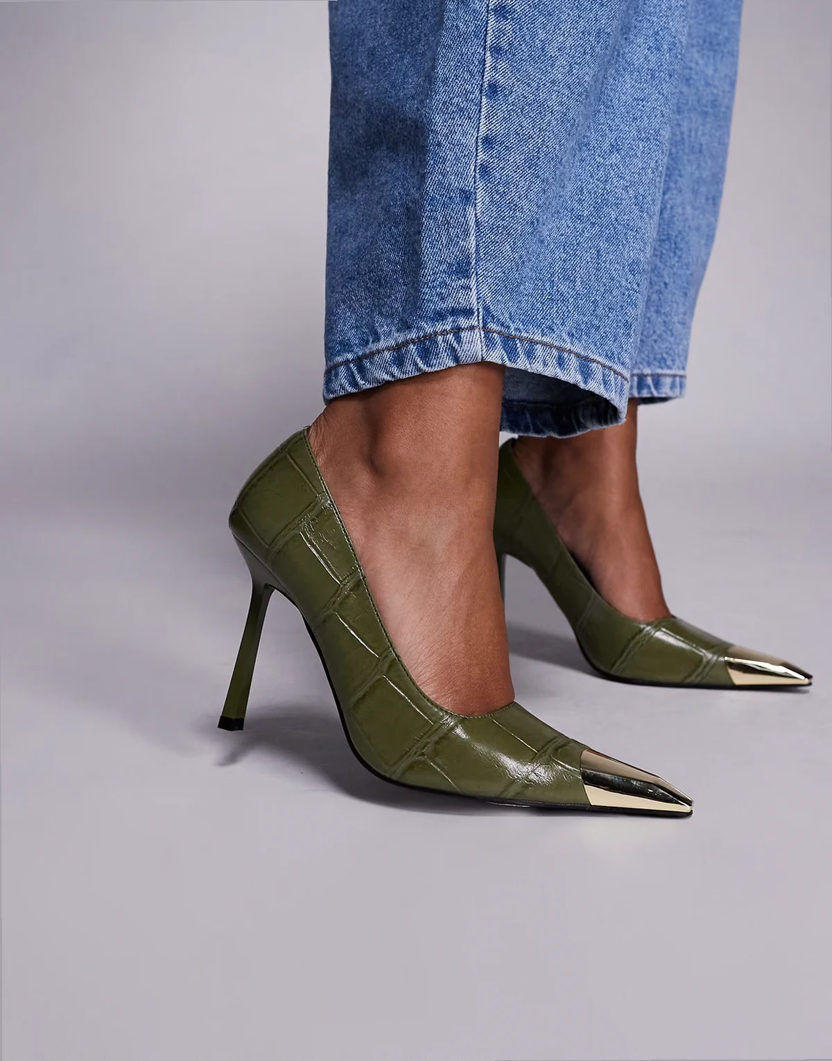 Rotate heeled pumps in green croc with gold toe caps