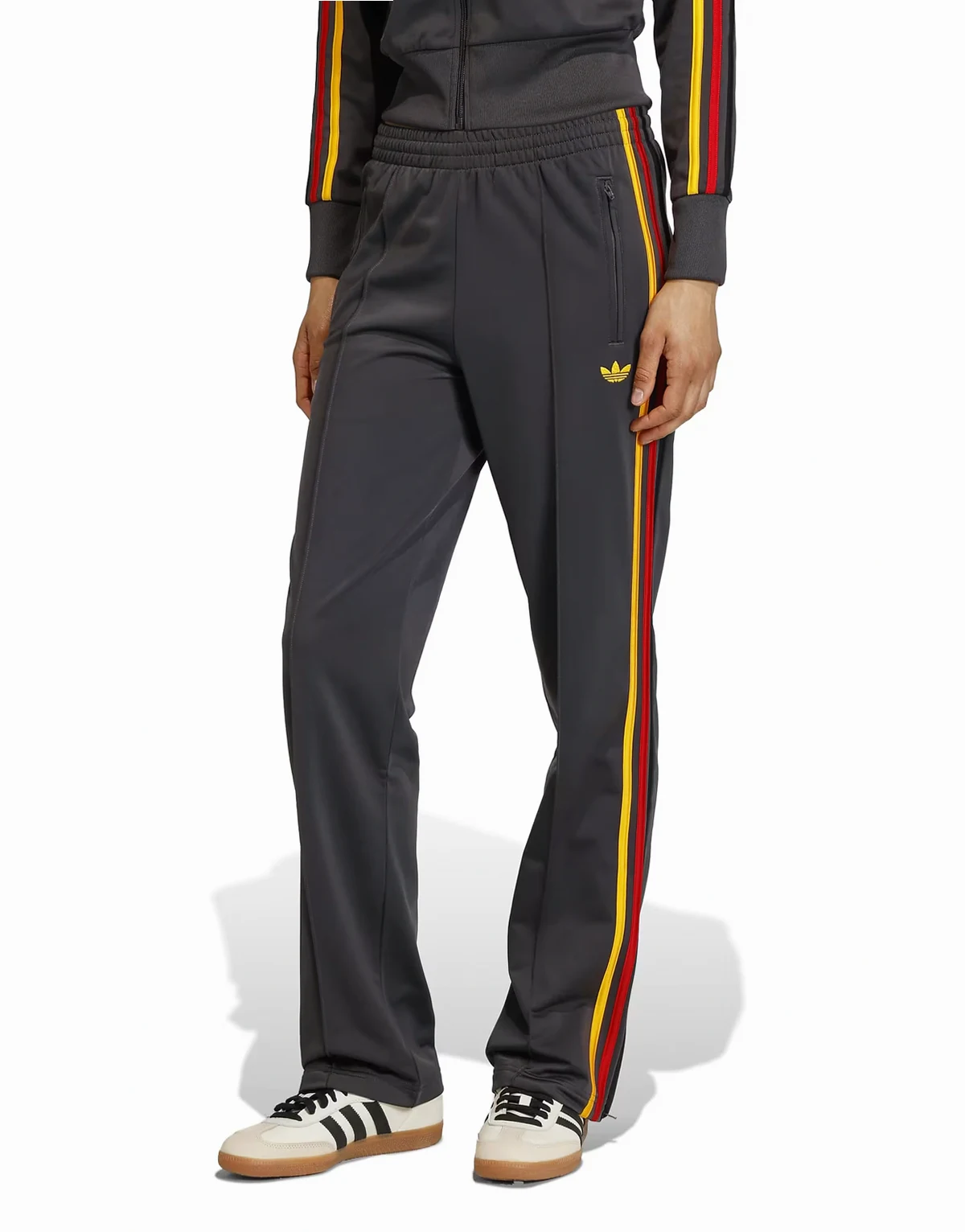 Firebird classic track pants in black and gold