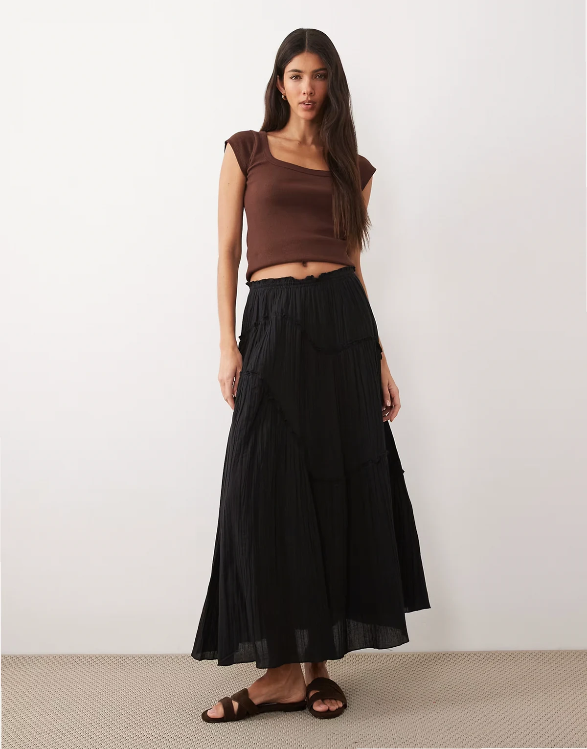 ruffle beach maxi skirt in black