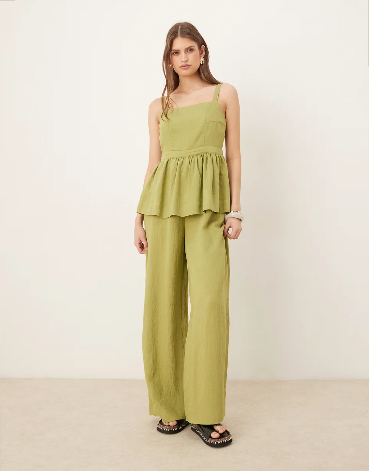 jumpsuit with peplum waist in olive green