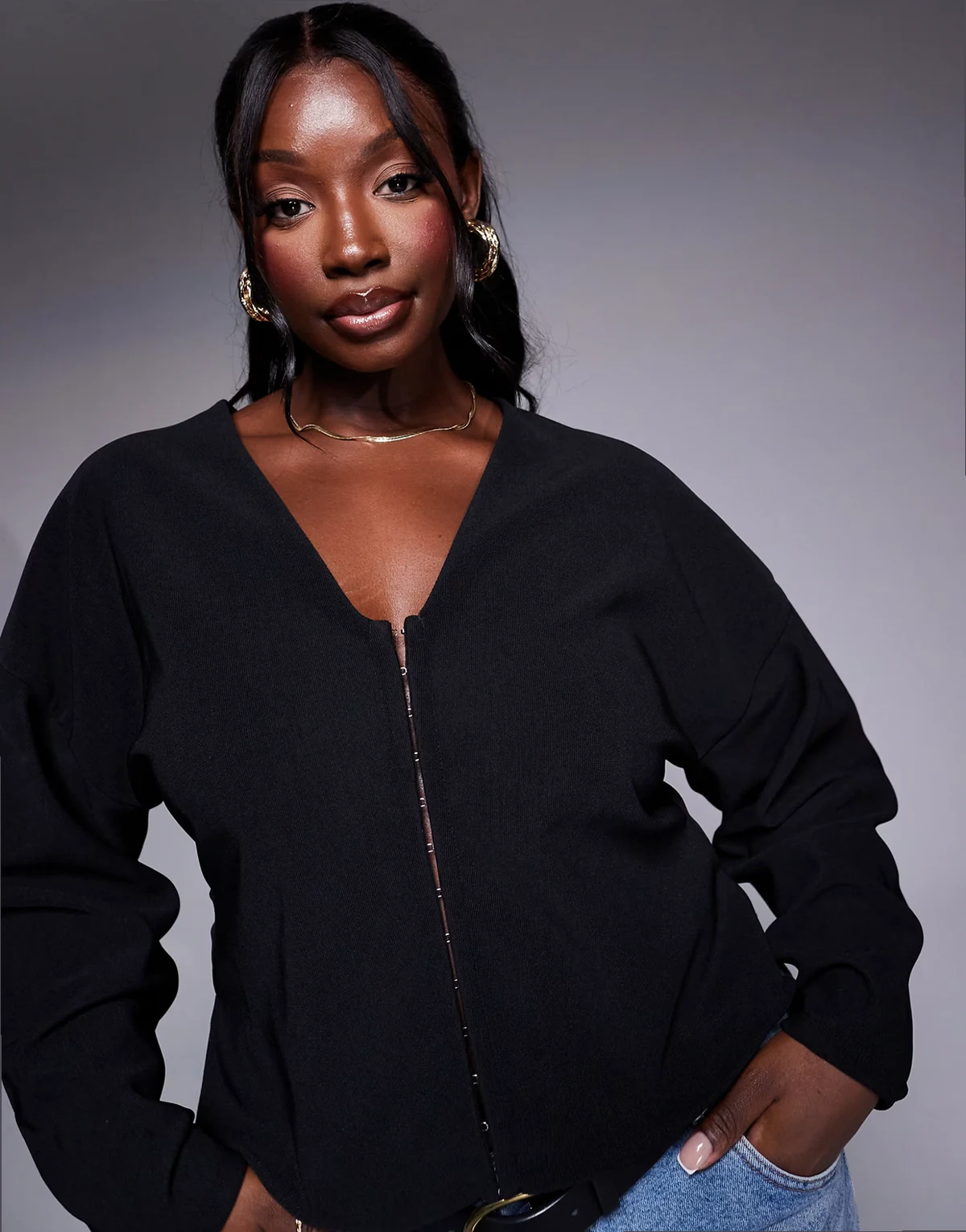 ASOS DESIGN Curve – Prążkowany czarny top z usztywnianymi balonowymi rękawami