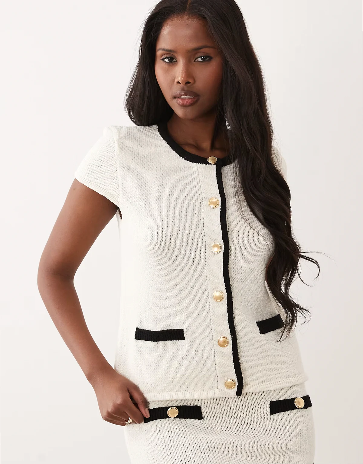 knit bouclé cardigan in ecru and black - part of a set