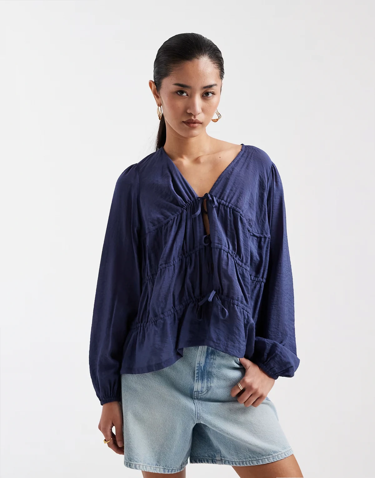 shirred long sleeve blouse with tie front in blue