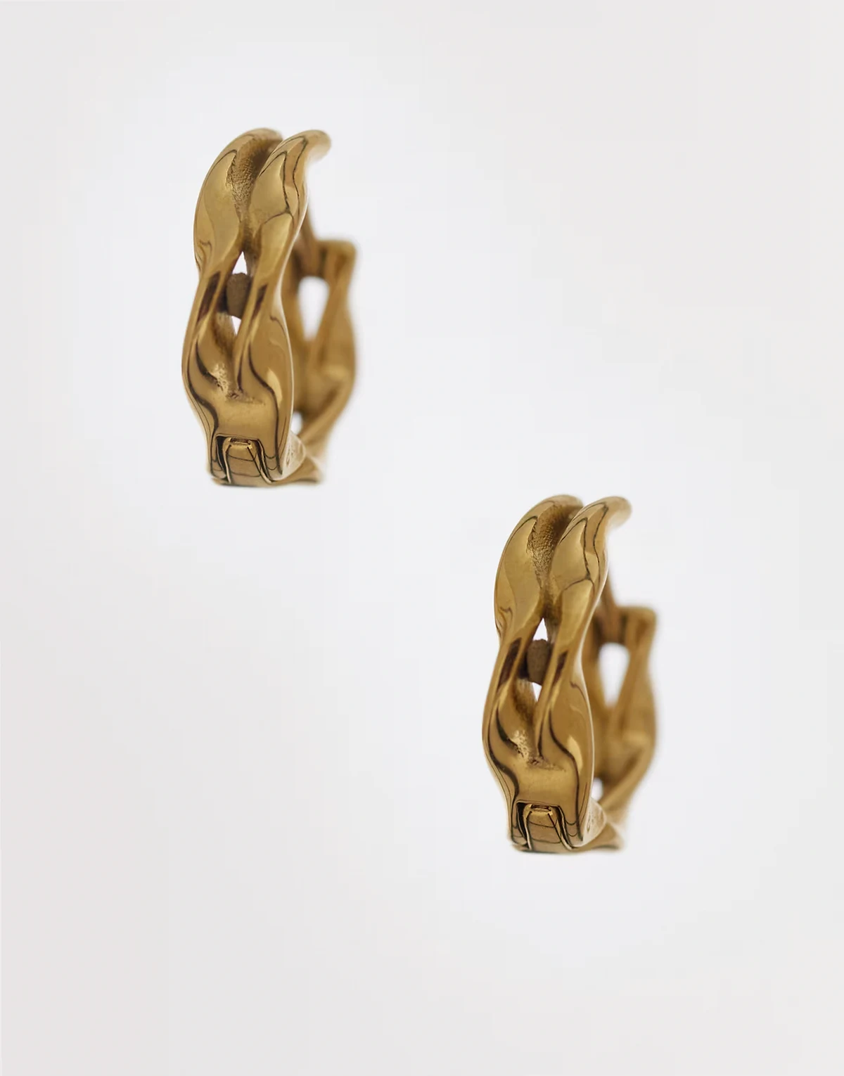 waterproof stainless steel twisted double row huggie hoop earrings in gold