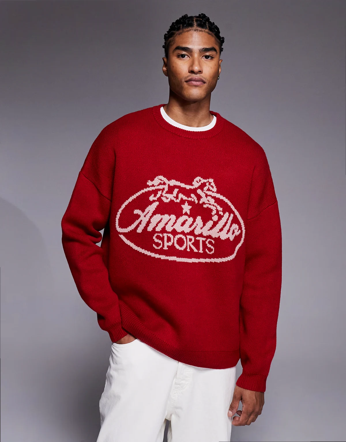 – Czerwony dzianinowy sweter o fasonie super oversize z grafiką z napisem Amarillo