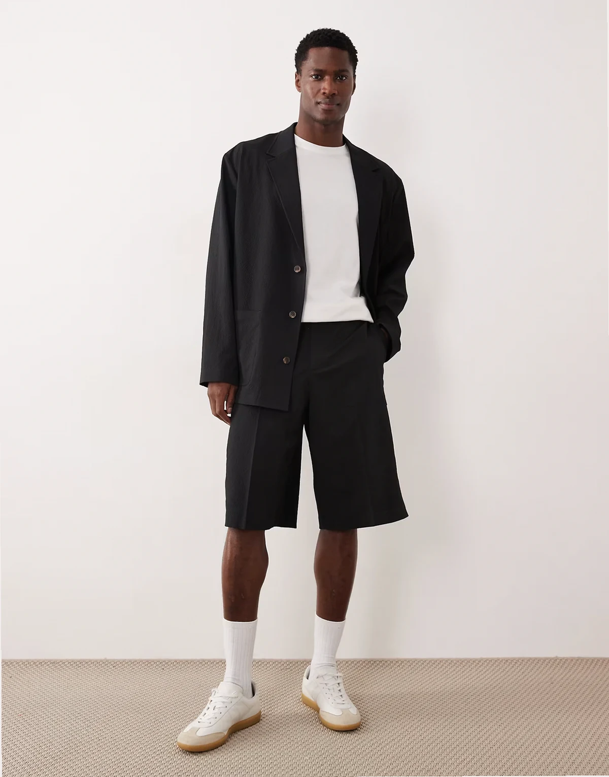 dressy oversized bermuda shorts in black seersucker - part of a set
