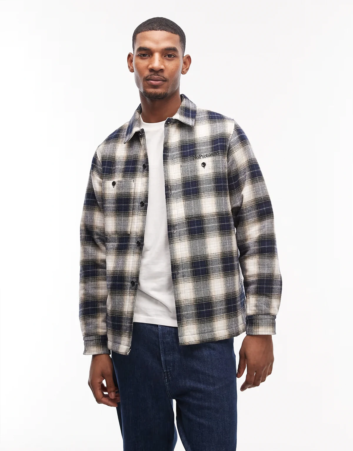 – Karierte Flanell-Hemdjacke in Marineblau mit gestepptem Futter