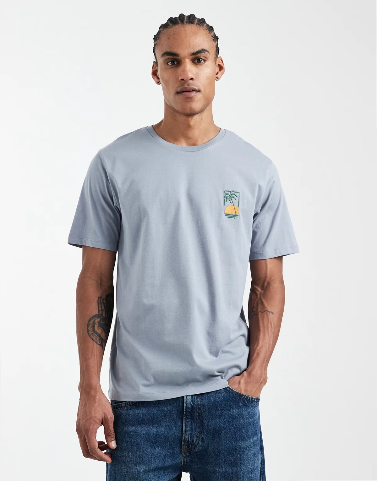 – Oversize-T-Shirt in Hellblau mit Palmenstickerei