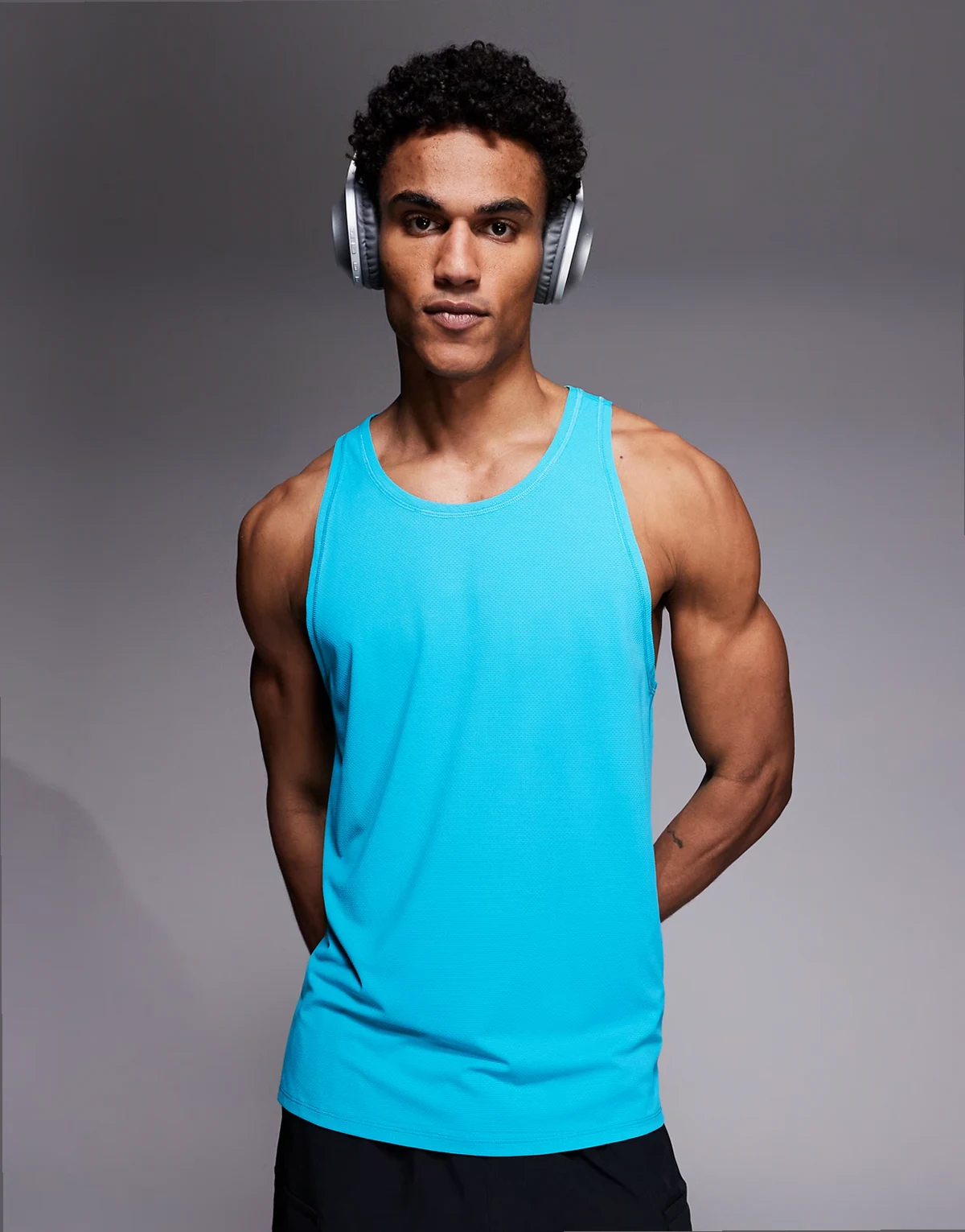 Icon quick dry mesh training tank top with racer back in bright turquoise