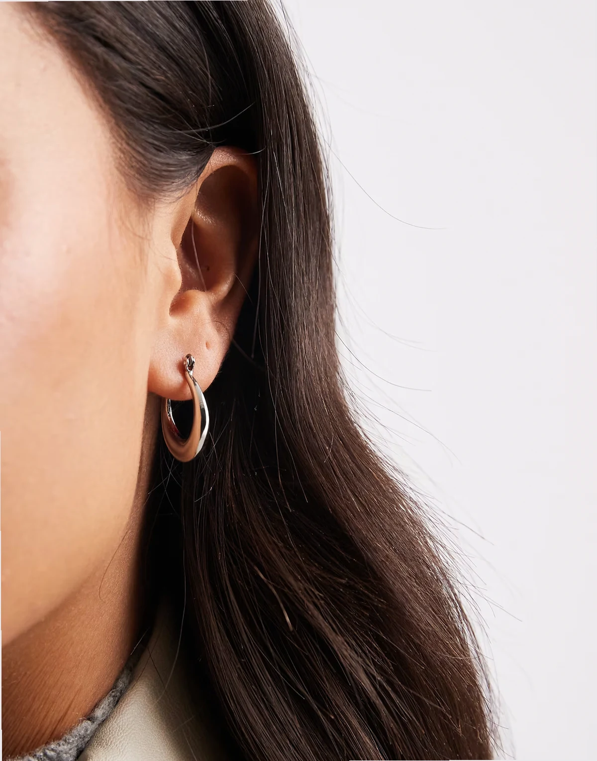irregular hoop earrings in silver tone