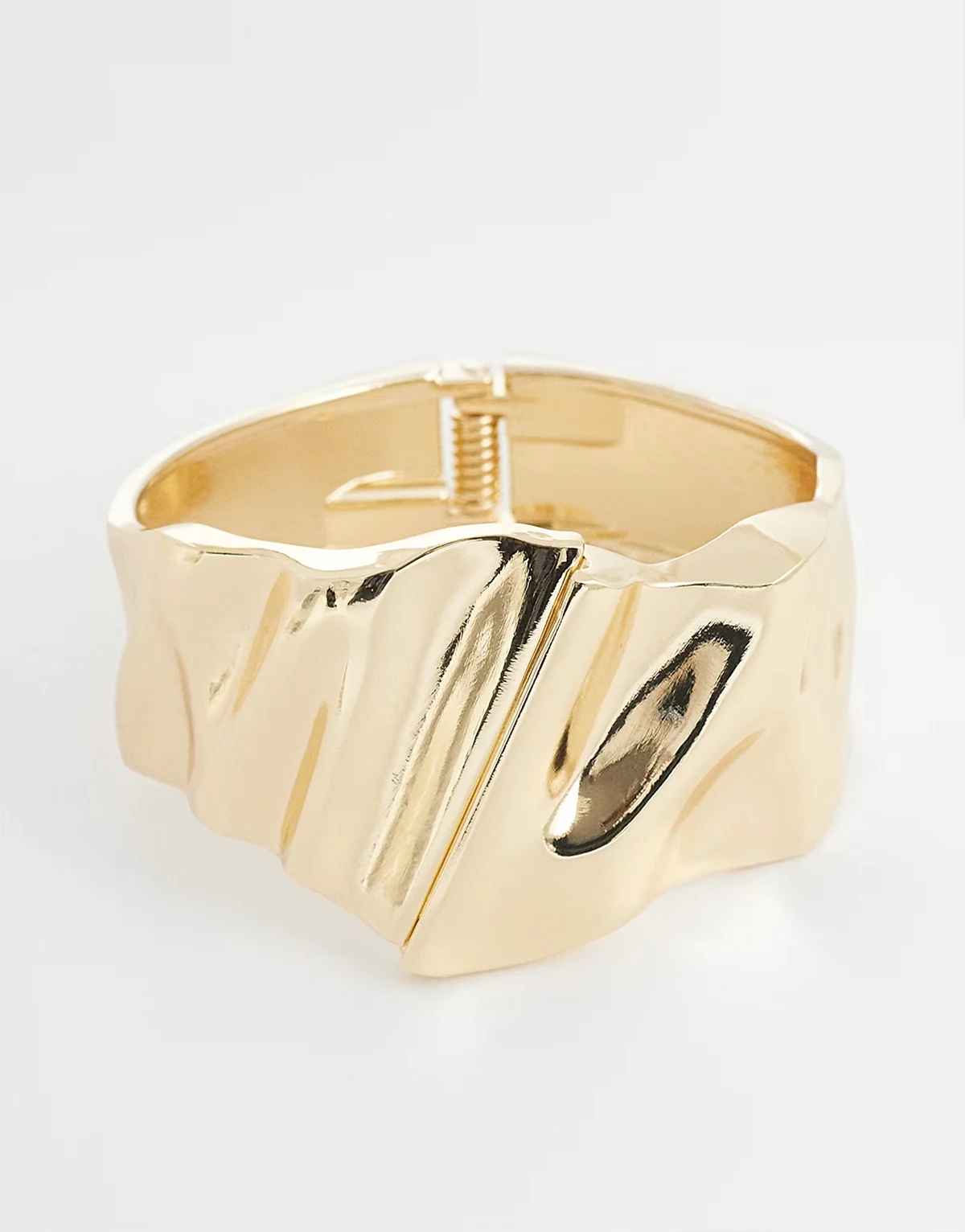 cuff bracelet with molten design in gold tone