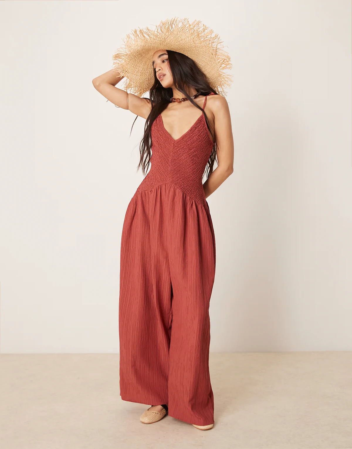 V neck poly crinkle dropped waist jumpsuit in rust