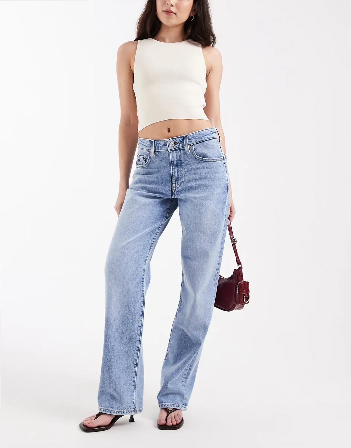Kira mid rise slim straight jeans in light wash blue