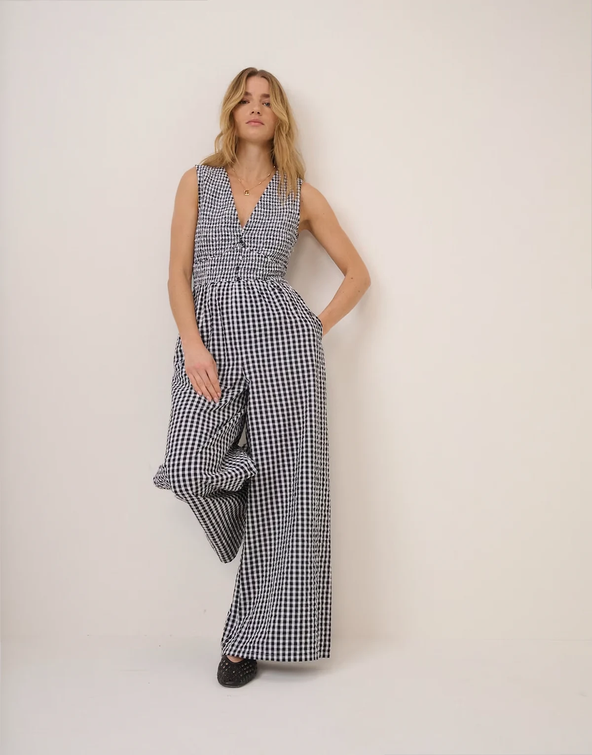 Carmen sleeveless v-neck cotton jumpsuit in black gingham